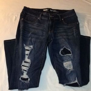 Distressed denim jeans